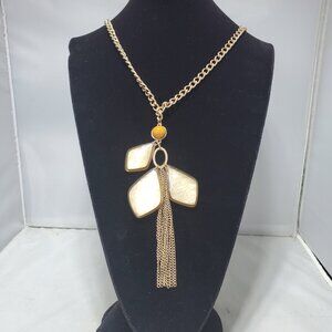 Vetta gold chain necklace consists of a mustard yellow spherical beads